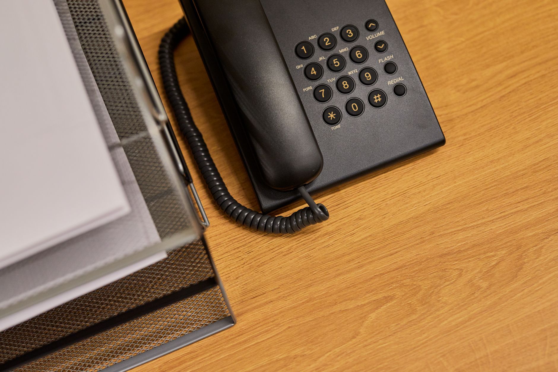 A desk telephone in an office
