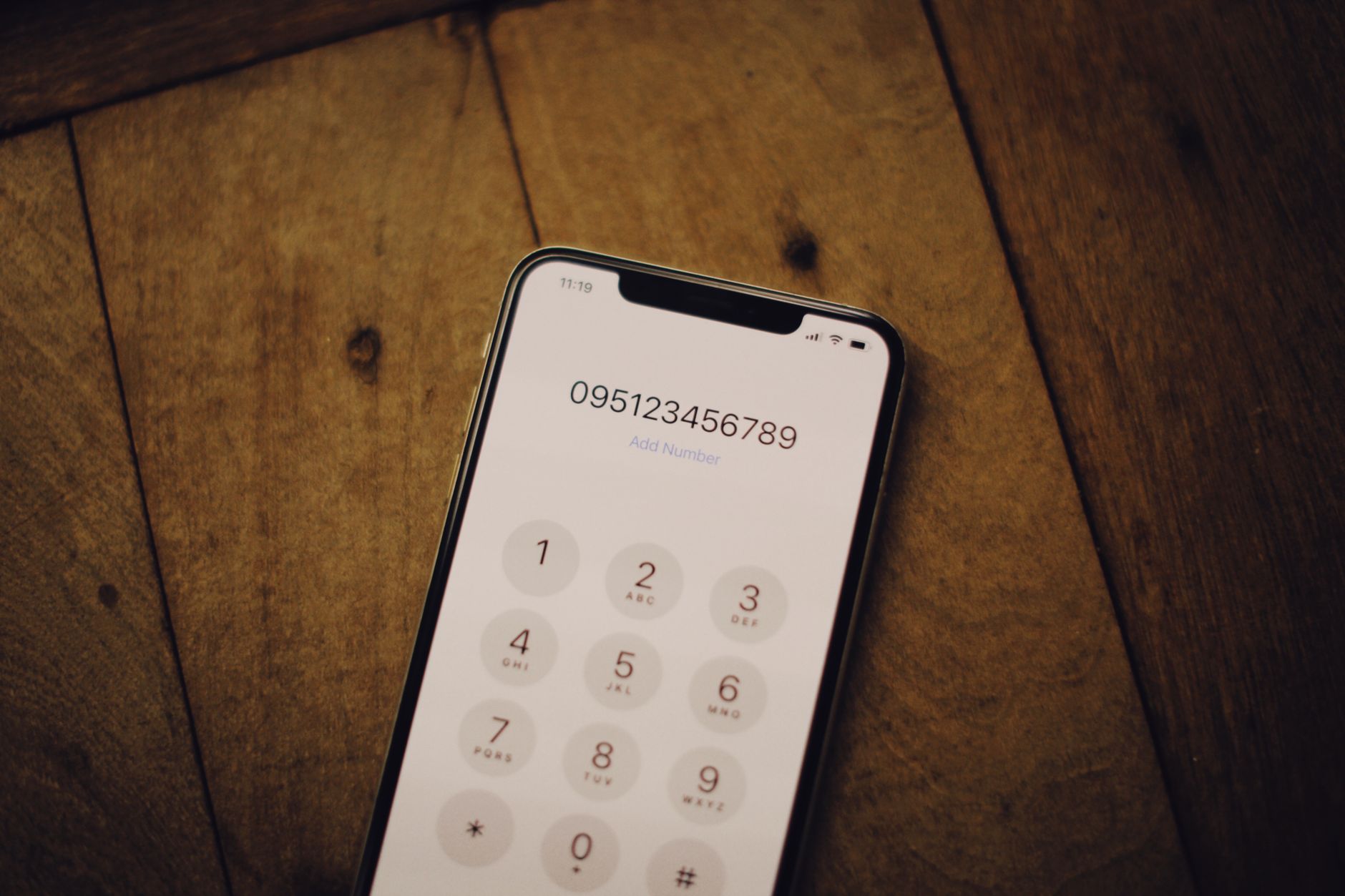 A phone dial pad on a smartphone screen